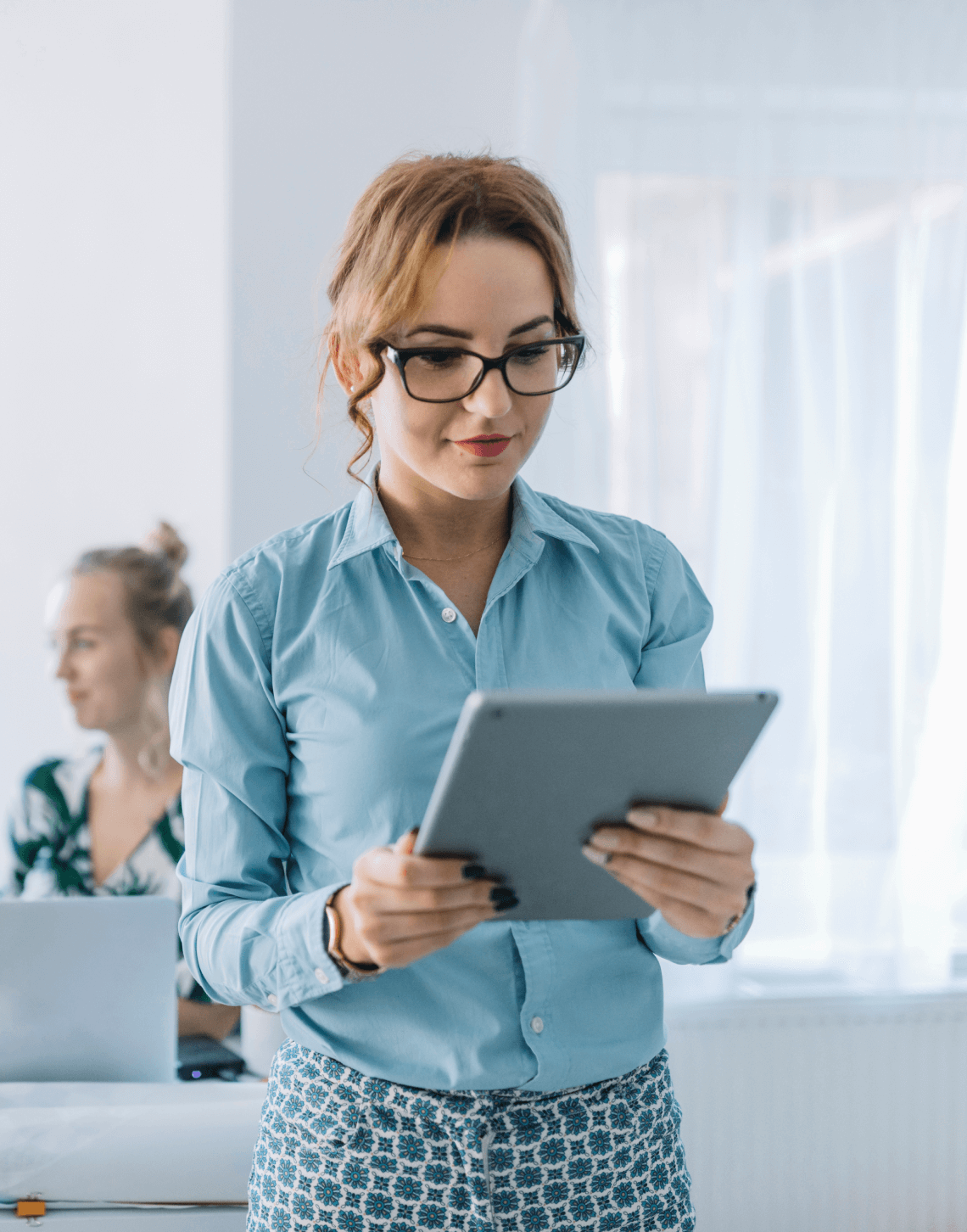 Teacher using technology for enhanced educational management and student engagement